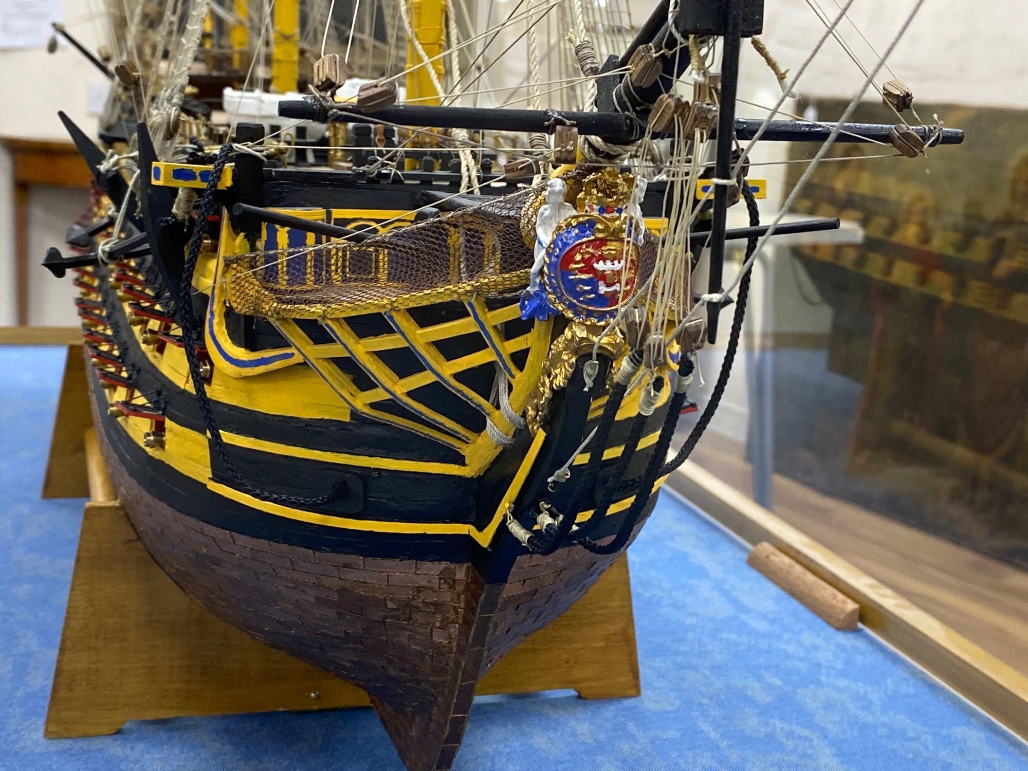 A model of the HMS Victory in perspex case, approximate length 120cm